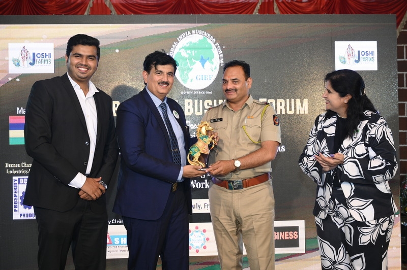 Participants engaging in discussions on global investment and safe work practices