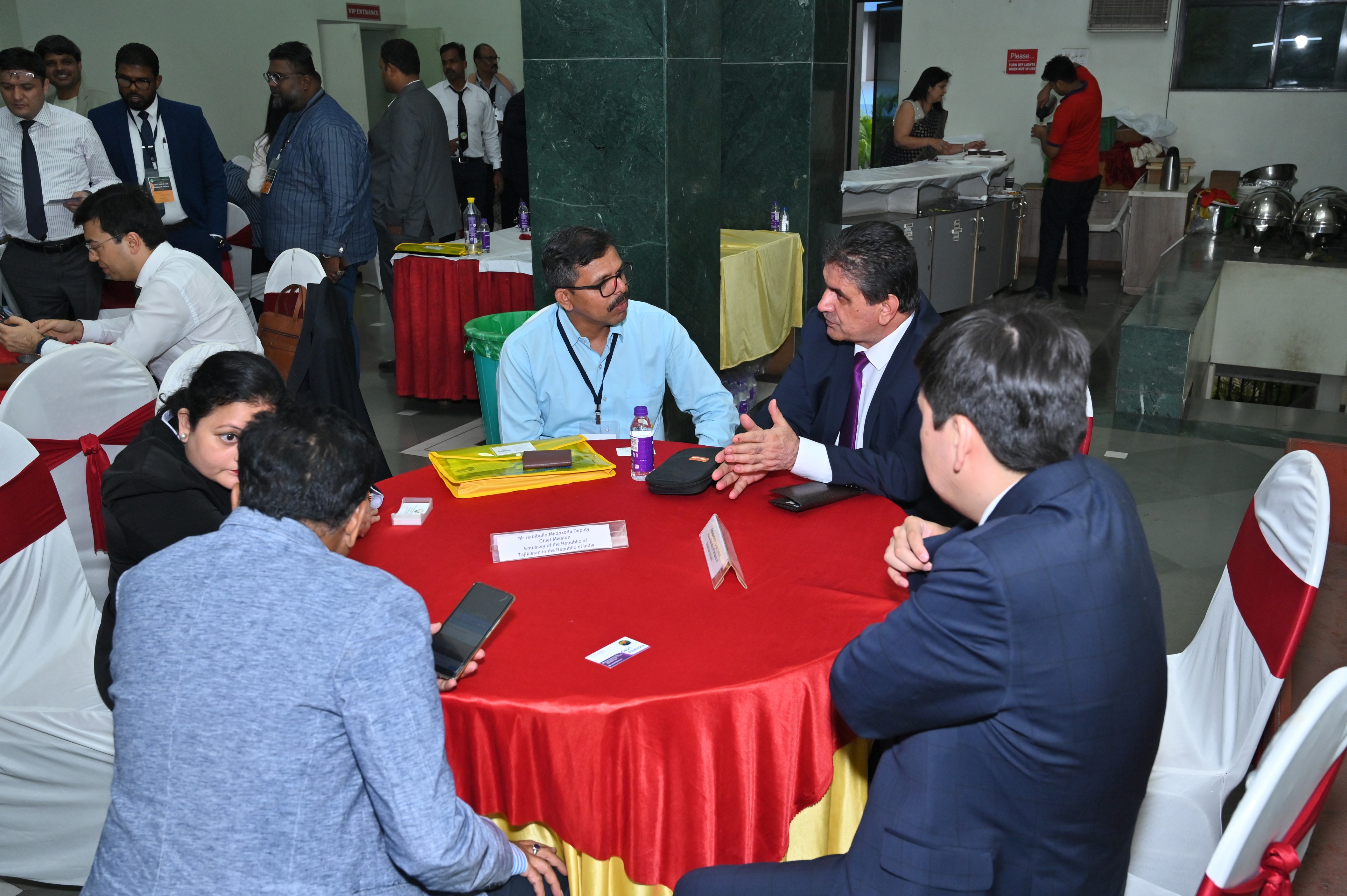 Delegates discussing investment potential across India and Central Asia